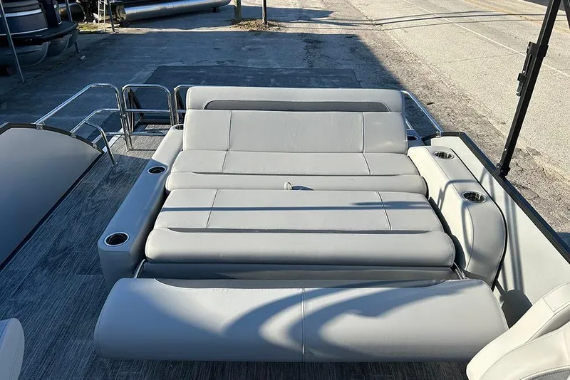 Slide: The Image of 2026 Bentley Pontoons Fish 243 Swingback with spacious seating and cup holders. - 33