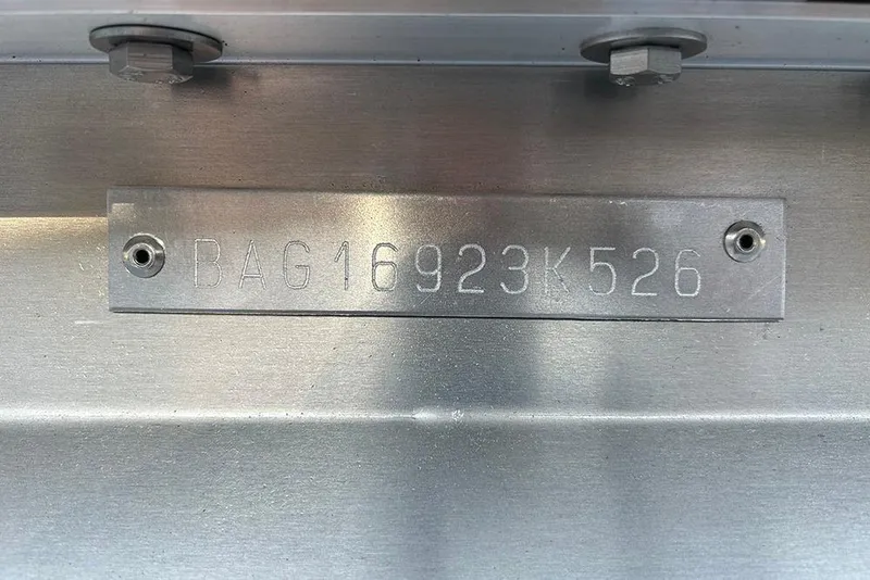 Slide: The Image of 2026 Bentley Pontoons Fish 243 Swingback hull identification number plate. - 35