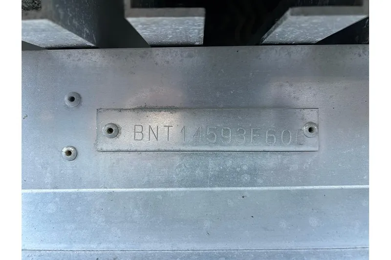 Slide: The Image of 2006 Bentley Pontoons 200 Fish hull identification number plate. - 13