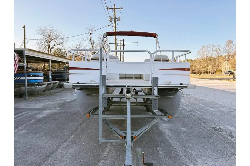 Slide: The Image of 2006 Bentley Pontoons 200 Fish on trailer, parked outdoors. - 3