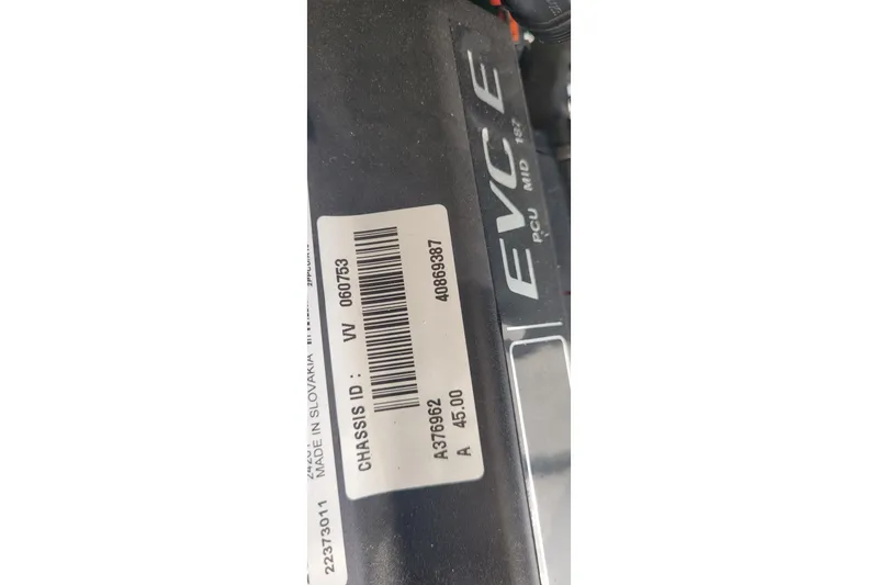 Slide: The Image of Label on Fortier 30 engine part, showing chassis ID and manufacturing details. - 45