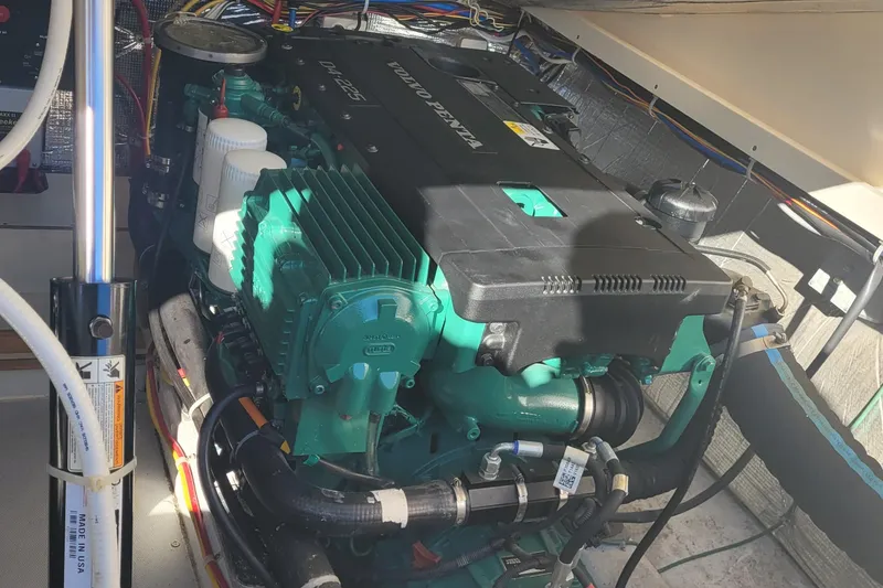 Slide: The Image of Steering wheel and dashboard of 2015 Fortier 30 boat with Volvo Penta gauges. - 39