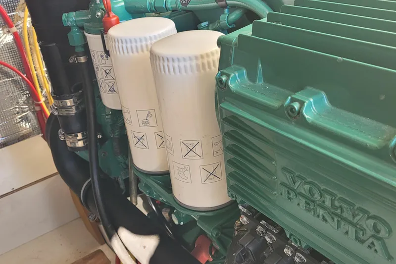 Slide: The Image of Volvo Penta engine in 2015 Fortier 30 boat, detailed view of engine compartment. - 42