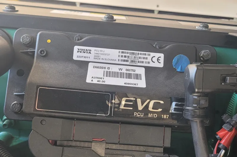 Slide: The Image of Emission control information label on a 2015 Fortier 30 boat engine. - 49