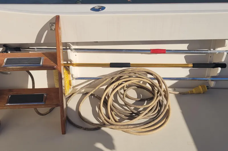 Slide: The Image of Fortier 30 boat canvas enclosure, 2015 model, with visible stitching and shadow. - 57