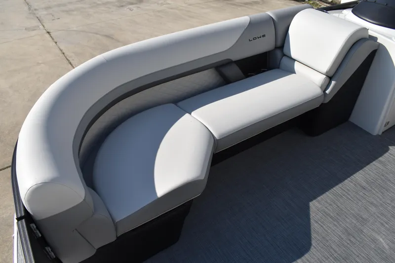 Slide: The Image of 2026 Lowe SF 232 Sport Fish boat with sleek, modern seating design. - 10