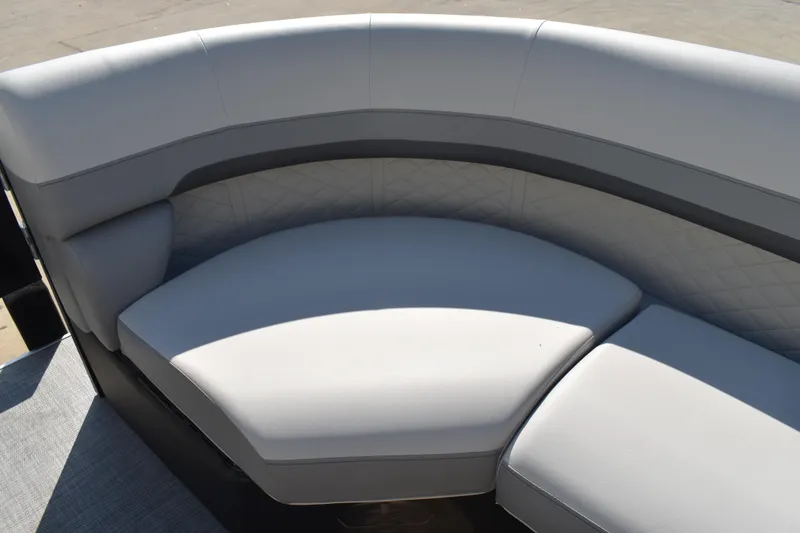 Slide: The Image of 2026 Lowe SF 232 Sport Fish boat with luxurious curved seating and quilted upholstery. - 16