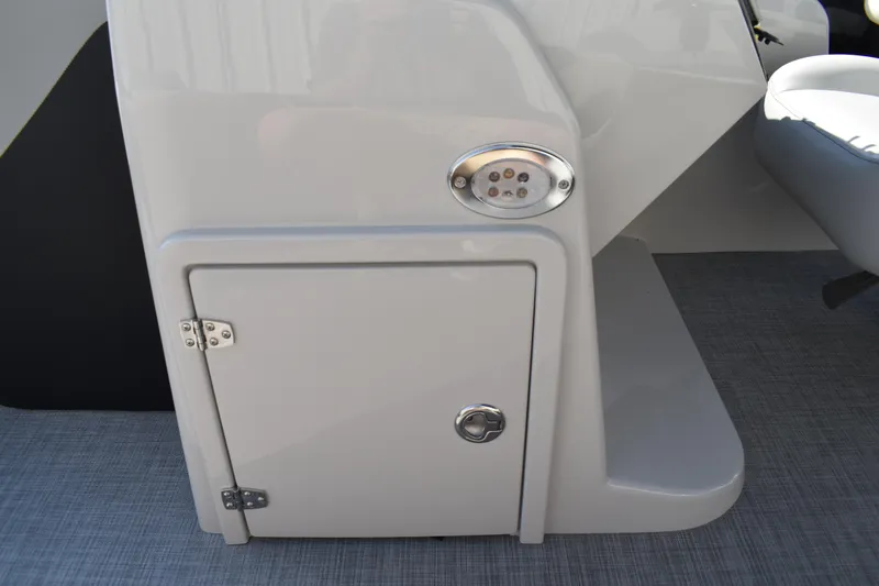 Slide: The Image of 2026 Lowe SF 232 Sport Fish boat console with storage compartment and LED light. - 25