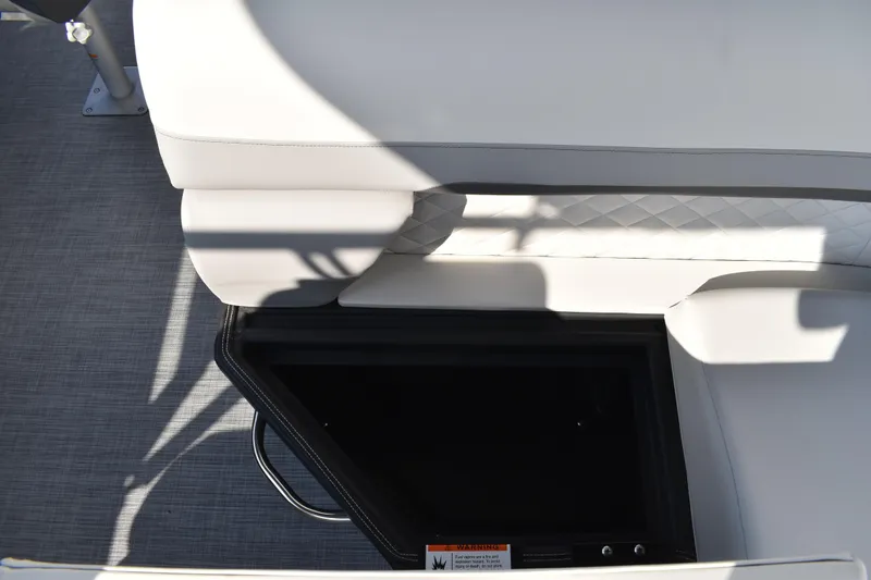 Slide: The Image of 2026 Lowe SF 232 Sport Fish boat seat with storage compartment open. - 38