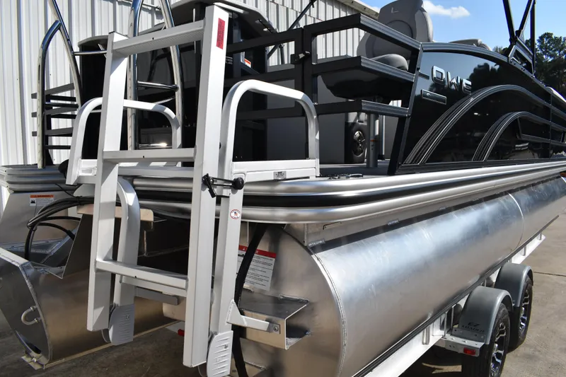 Slide: The Image of 2026 Lowe SF 232 Sport Fish pontoon boat with ladder and sleek design. - 5