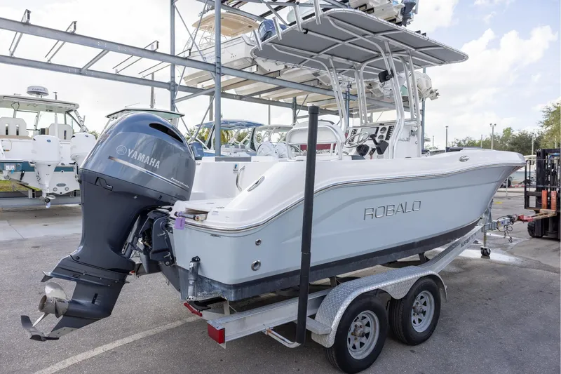 Slide: The Image of 2019 Robalo R202 Explorer boat with Yamaha engine on trailer. - 4