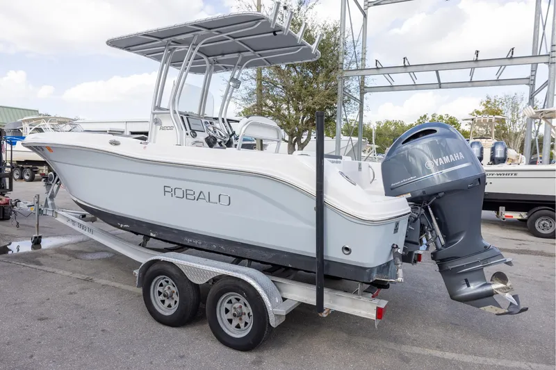 Slide: The Image of 2019 Robalo R202 Explorer boat on trailer with Yamaha outboard motor. - 5