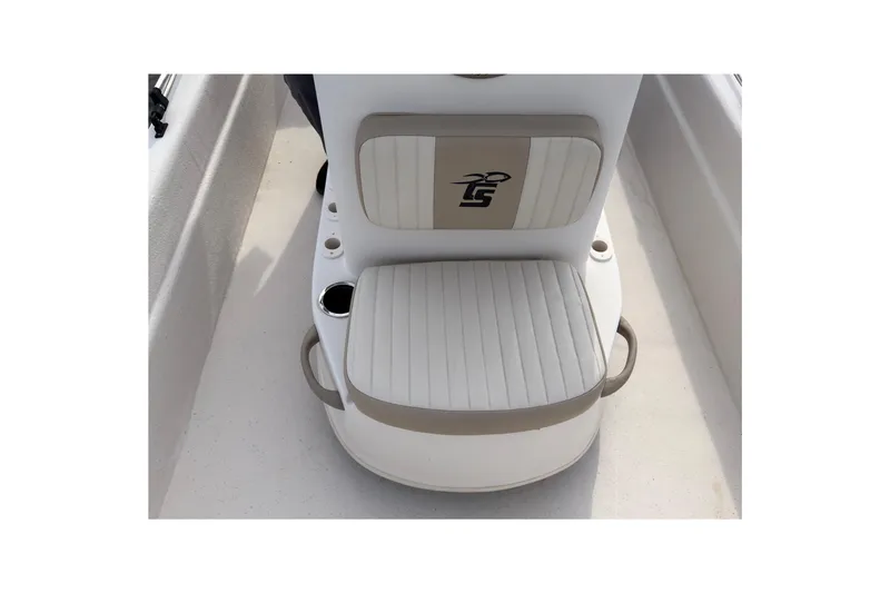 Slide: The Image of 2017 Carolina Skiff 18 JVX CC boat seat with cup holders and logo. - 14