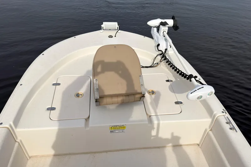 Slide: The Image of 2017 Carolina Skiff 18 JVX CC boat deck with seating and trolling motor. - 8