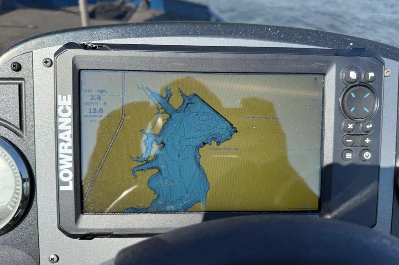 Slide: The Image of Lowrance GPS display on 2020 Triton 17 TX boat showing detailed water map. - 28