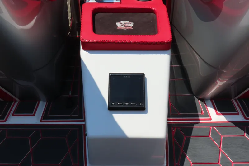 Slide: The Image of Center console of 2018 Wright Performance 360 boat with Garmin display and red accents. - 15
