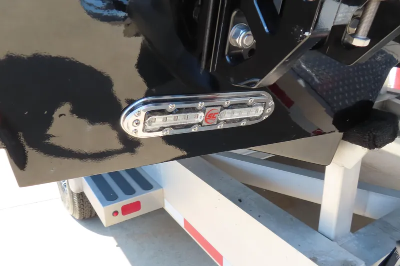 Slide: The Image of 2018 Wright Performance 360 boat with LED light detail on trailer. - 18