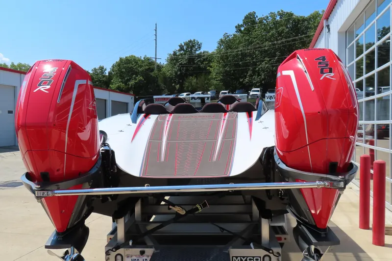 Slide: The Image of 2018 Wright Performance 360 boat with dual red Mercury 450R engines on a trailer. - 6