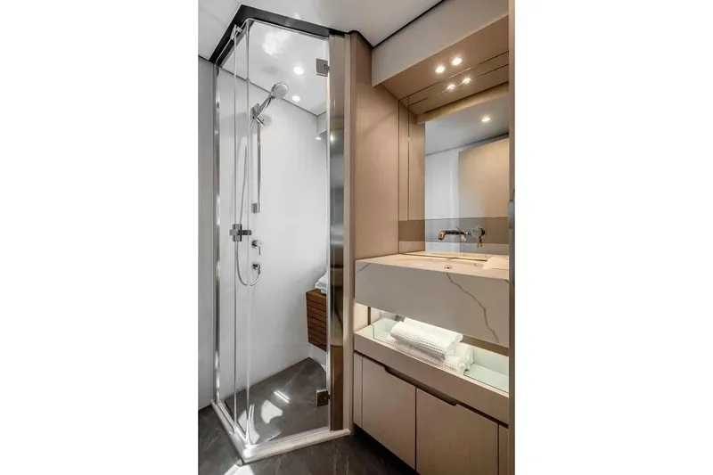 Slide: The Image of Manufacturer Provided Image: Luxurious bathroom in 2025 Azimut Fly 68 yacht with modern shower and elegant sink. - 14