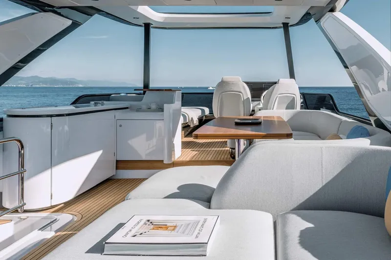 Slide: The Image of Manufacturer Provided Image: Luxurious interior of 2025 Azimut Fly 68 yacht with modern seating and ocean view. - 6