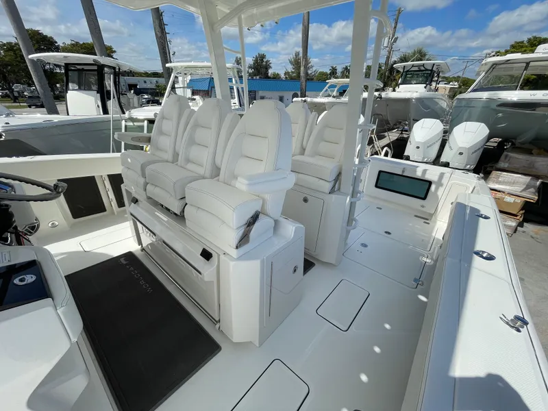 Slide: The Image of 2024 World Cat 400 CC-X boat interior with luxurious seating and modern design. - 15