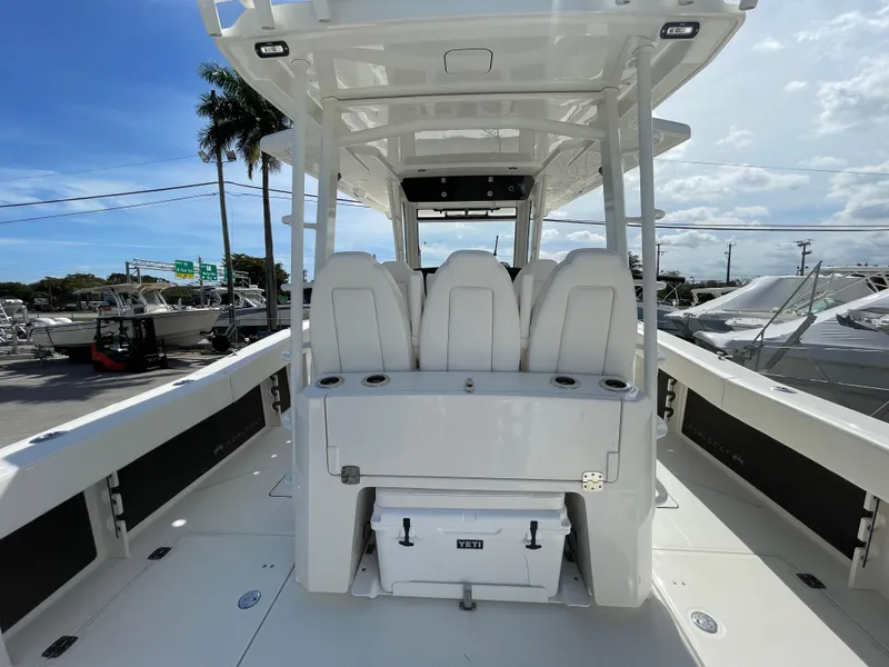 Slide: The Image of 2024 World Cat 400 CC-X boat interior with seating and cooler. - 17