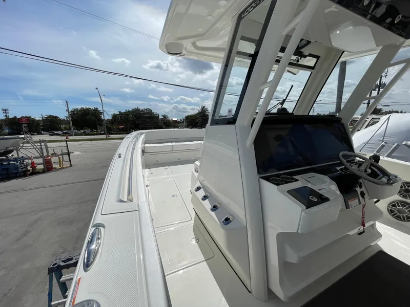 Slide: The Image of 2024 World Cat 400 CC-X boat cockpit and helm station. - 9