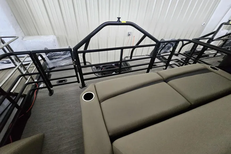 Slide: The Image of 2026 Starcraft SLS 3 Q DH boat interior with seating and railing. - 14