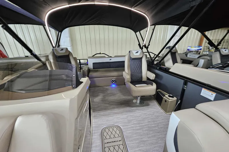 Slide: The Image of Luxurious interior of 2026 Starcraft SLS 3 Q DH boat with modern seating and lighting. - 6