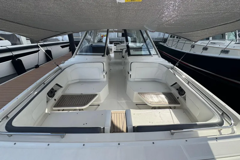 Slide: The Image of 2023 World Cat 400 DC-X boat interior with spacious seating and modern design. - 17