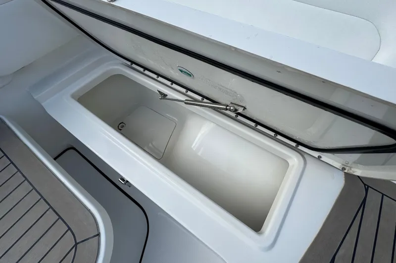 Slide: The Image of Open storage compartment on 2023 World Cat 400 DC-X boat, featuring sleek design and spacious interior. - 20
