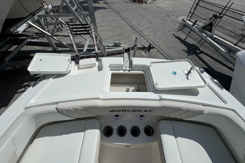 Slide: The Image of 2026 World Cat 230 SD boat interior with seating and storage compartments. - 11