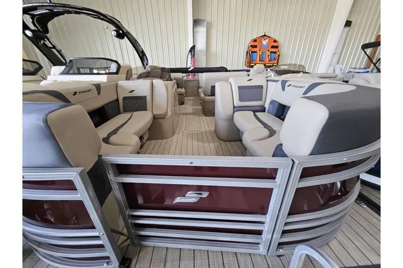 The Image of 2024 Starcraft CX 23 RL pontoon boat interior with spacious seating and modern design. - 0