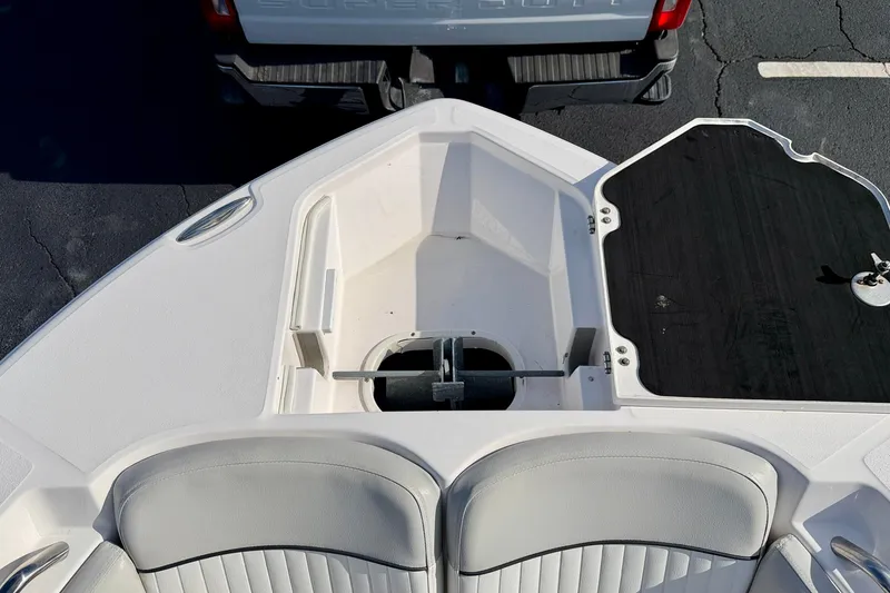 Slide: The Image of 2023 Sea Fox 228 Commander boat interior with seating and storage compartments. - 15