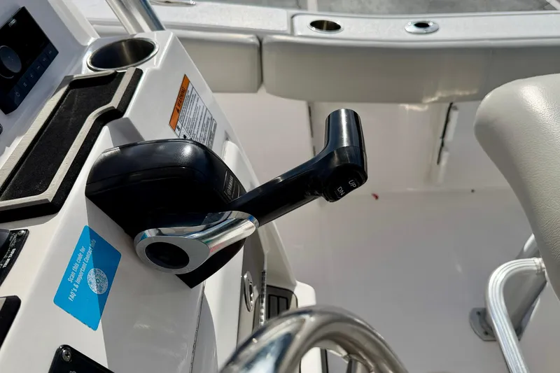 Slide: The Image of 2023 Sea Fox 228 Commander boat throttle control and console details. - 28