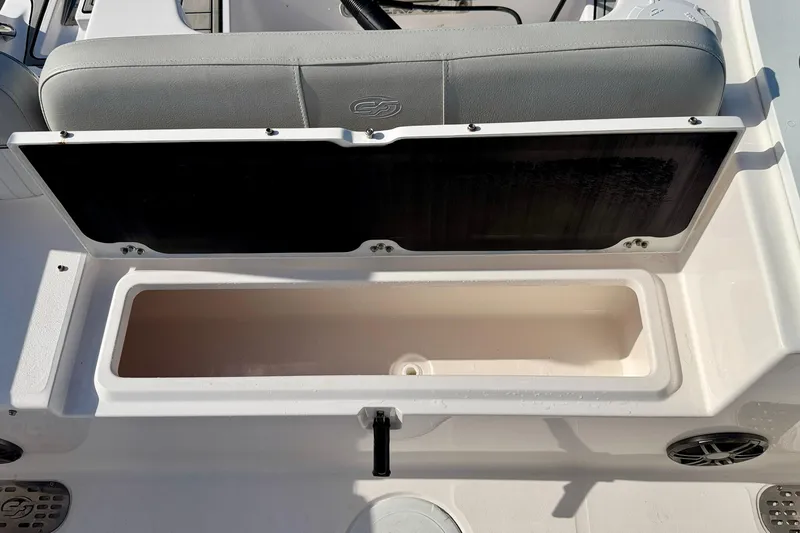 Slide: The Image of 2023 Sea Fox 228 Commander boat storage compartment with open lid. - 36