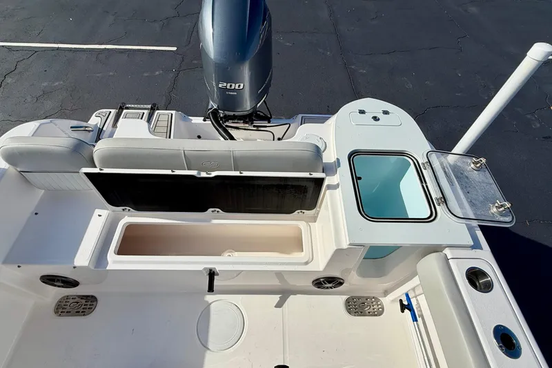 Slide: The Image of 2023 Sea Fox 228 Commander boat interior with Yamaha 200 engine, storage, and seating. - 37