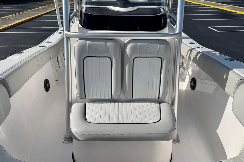 Slide: The Image of 2023 Sea Fox 228 Commander boat interior with cushioned seating and sleek design. - 9