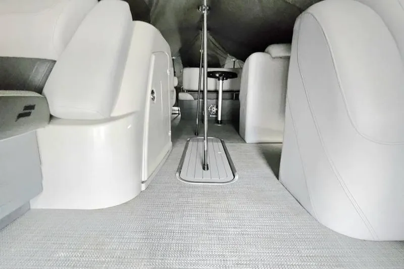 Slide: The Image of Interior of 2024 Starcraft CX 23 RL boat with sleek seating and modern design. - 11