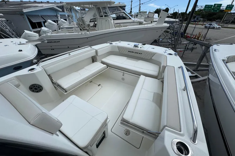 Slide: The Image of 2026 World Cat 235 TE boat with spacious seating and modern design. - 13
