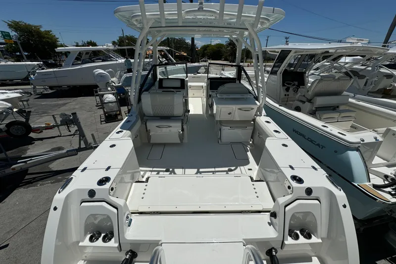 Slide: The Image of 2026 World Cat 265 DC-X boat interior, featuring spacious seating and modern amenities. - 21