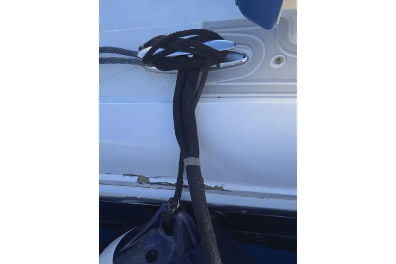 Slide: The Image of Rope tied to cleat on 2014 Midnight Express 37 EXK boat. - 26