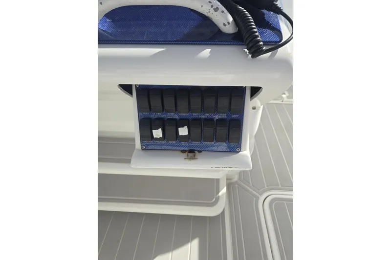 Slide: The Image of Control panel on a 2014 Midnight Express 37 EXK boat deck. - 33