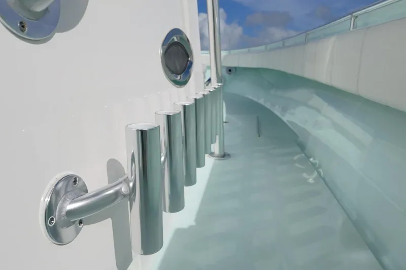 Slide: The Image of 2025 Contender 39 ST boat with sleek rod holders and modern design. - 20