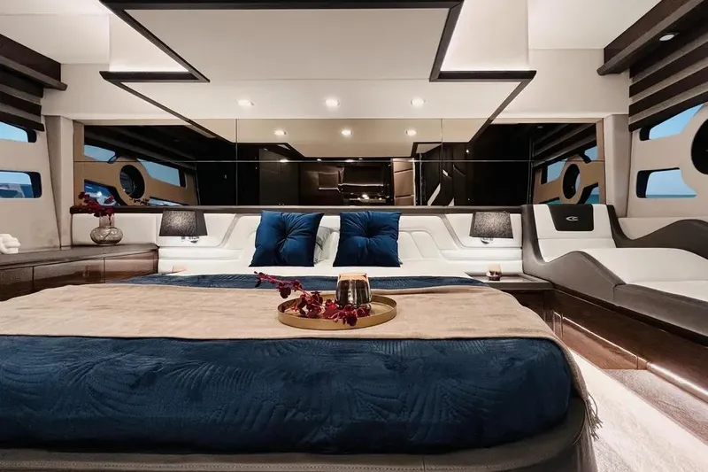 Slide: The Image of Luxurious interior of 2025 Cobrey 52 FLY yacht with elegant bedroom design. - 15