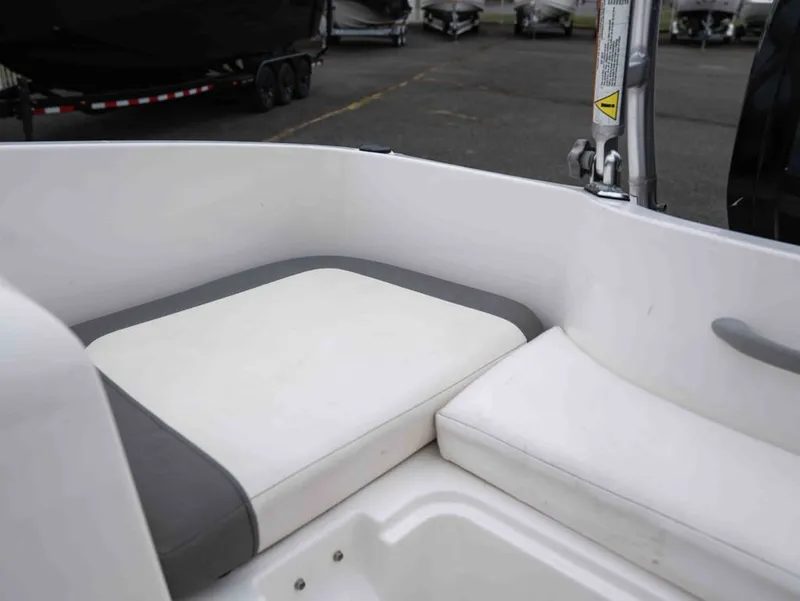 Slide: The Image of Interior view of 2016 Bayliner Element E16 boat with seating cushions. - 16