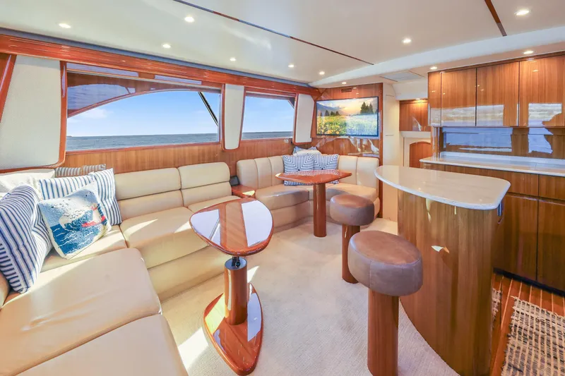 Slide: The Image of Luxurious interior of 2013 Viking 46 Convertible yacht with elegant seating and wooden finishes. - 14