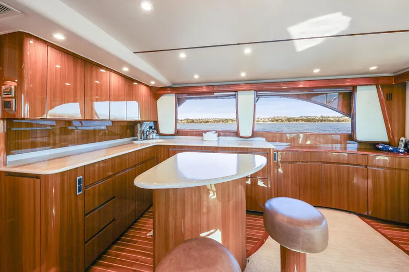 Slide: The Image of Luxurious interior of 2013 Viking 46 Convertible yacht with polished wood finishes. - 22