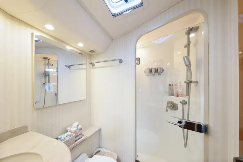 Slide: The Image of Luxurious bathroom in 2013 Viking 46 Convertible yacht with modern shower and elegant fixtures. - 30