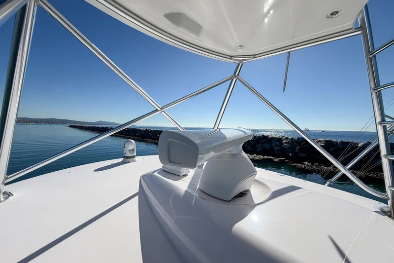 Slide: The Image of 2013 Viking 46 Convertible yacht, ocean view from deck, clear blue sky. - 39